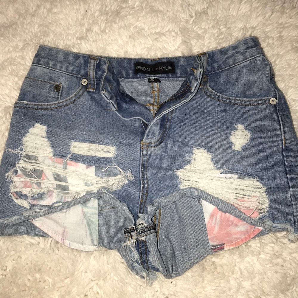 Kendall + Kylie distressed denim shorts.